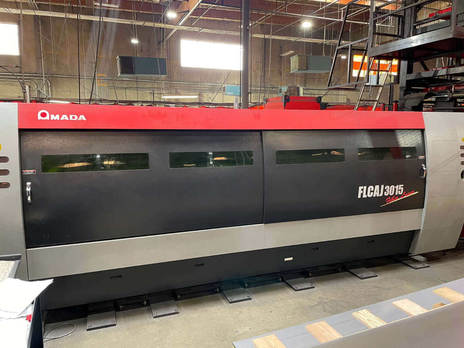 Used 2000 Watt Amada FLC-AJ3015 CNC Fiber Laser Cutter, Stock 1180 - Blackstone Machinery